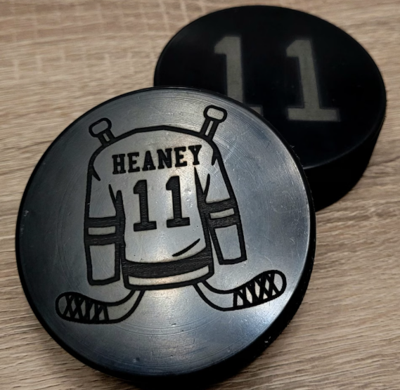 Custom engraved hockey pucks